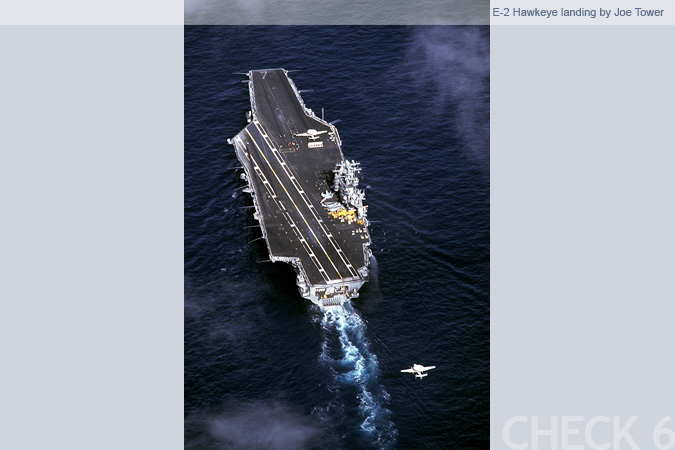 E-2 Hawkeye Landing on a US Navy Carrier - by Joe Tower