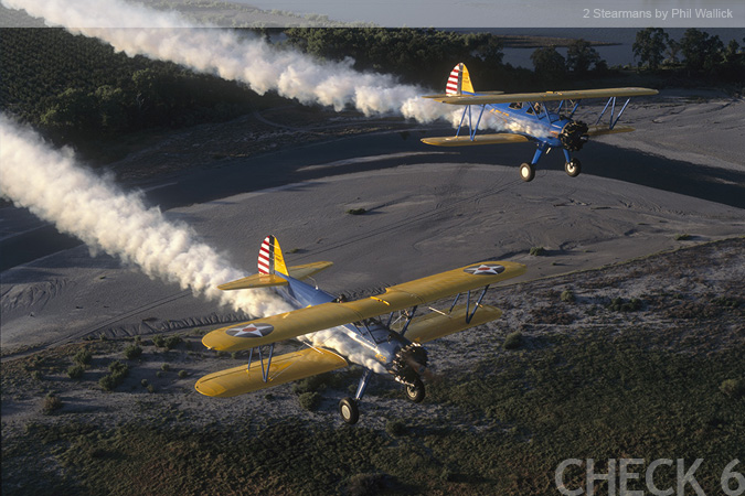 2 Stearman's in Flight - by Phil Wallick